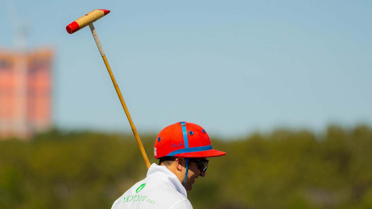 new york man holding brown wooden stick during daytime photo united states